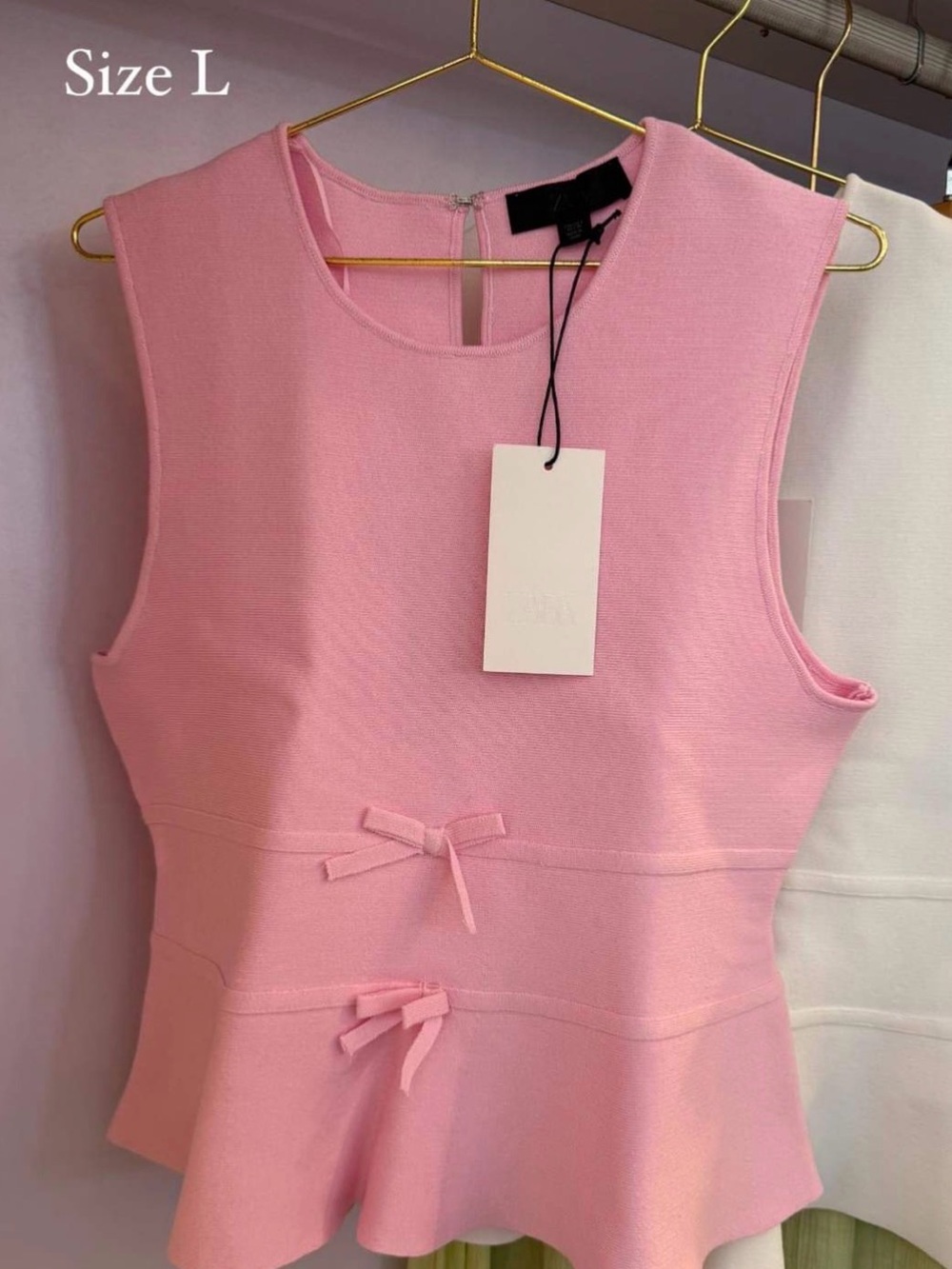 FATE Sleeveless Pink Peplum Knit Dress with Bow Detail
